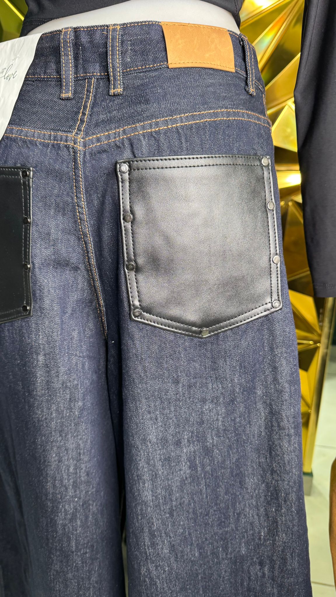 Jeans donna tasca pelle